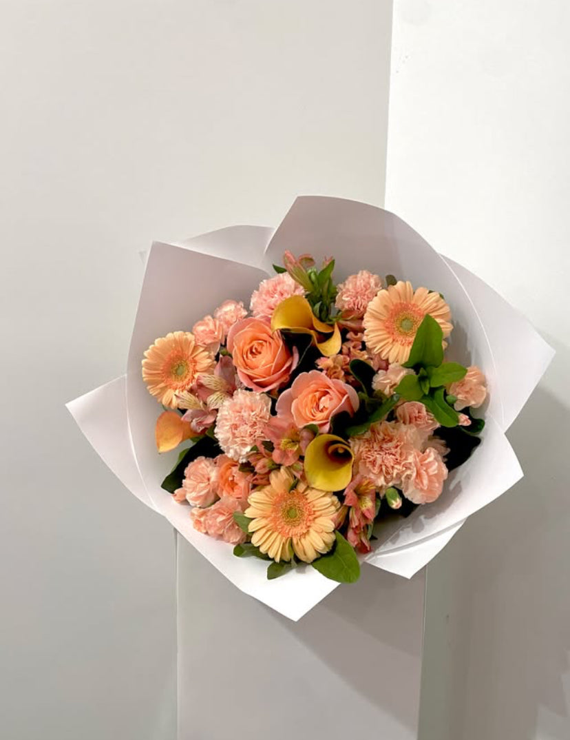 Luxurious apricot blooms bouquet, featuring 10 stunning flowers, perfect for celebrations with same day flower delivery by Naked Fern Florals.