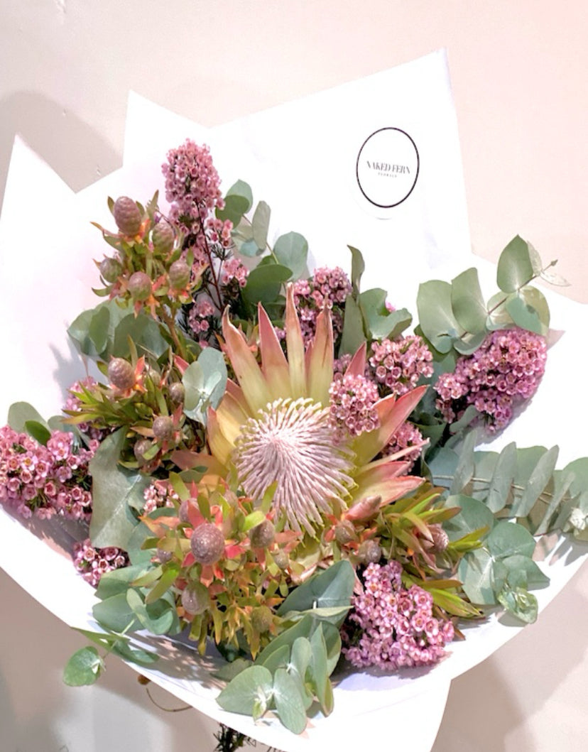Deb Native Beauty: Elegant dried native flowers arranged beautifully by Naked Fern Florals, offering same day delivery flowers native dried flowers. Perfect for any occasion, showcasing the rich biodiversity of Australia. #brisbaneflorist, #everydayflowers, #mothersdayflowers, #Nakedfernflowers, #weddingflowers