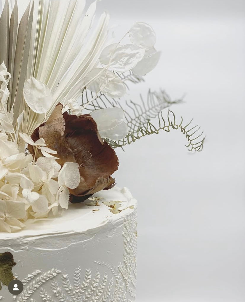 Close-up of an elegant blend of dried preserved flowers from Naked Fern Florals, featuring soft tones and textures that reflect the beauty of the Nevaeh ForEver bouquet. A perfect choice for those who appreciate sustainable luxury in floral arrangements. #brisbaneflorist #everydayflowers #mothersdayflowers #Nakedfernflowers #weddingflowers