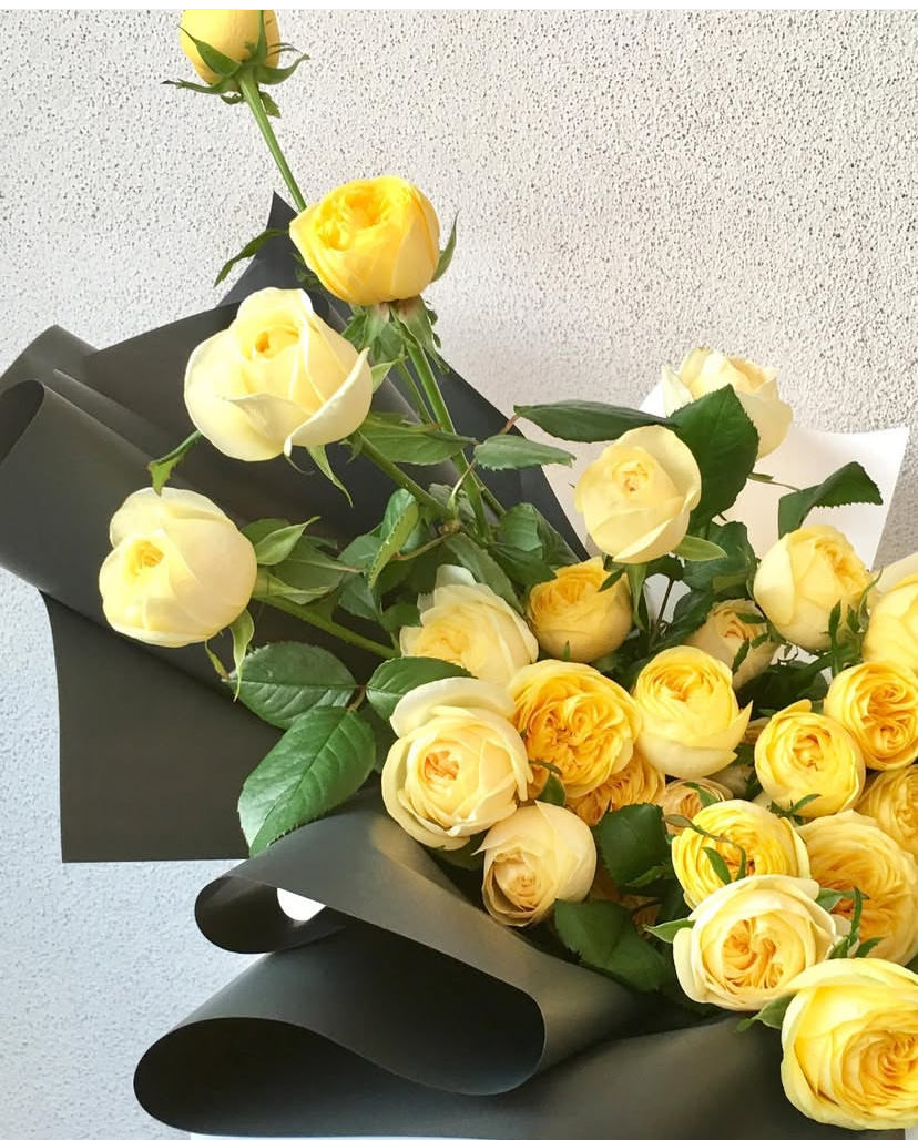 A beautifully arranged bouquet of yellow roses with lush greenery, designed by Naked Fern Florals. The Julieta Bouquet of Roses elegantly embodies the joy of gifting fresh flowers for any special occasion. Perfect for creating delightful memories. #brisbaneflorist #everydayflowers #mothersdayflowers #Nakedfernflowers #weddingflowers